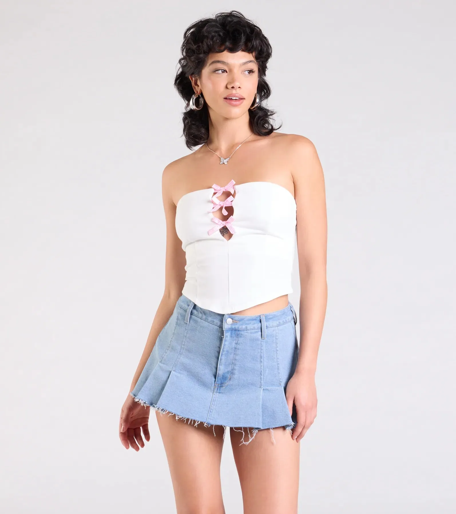 Lookin' Cute Bow-Trim Cutout Top sold by Windsor