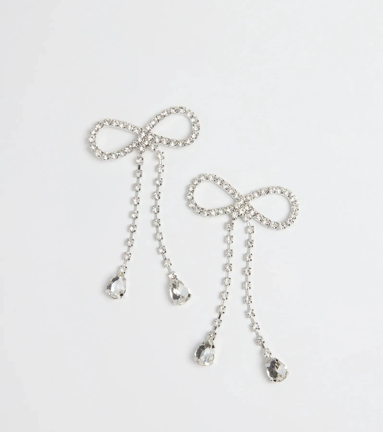 Adorably Glam Rhinestone Bow Drop Earrings sold by Windsor