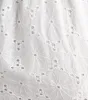 Effortless Eyelet Bubble Hem Mini Dress sold by Windsor