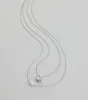 All About Luxe Pearl Cubic Zirconia Charm Necklace sold by Windsor