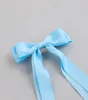 Poised Impression Ribbon Hair Bow Clip sold by Windsor