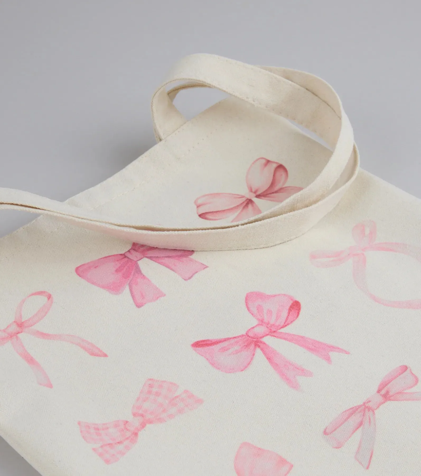 About A Girl Bow Canvas Tote Bag sold by Windsor product image thumbnail 2