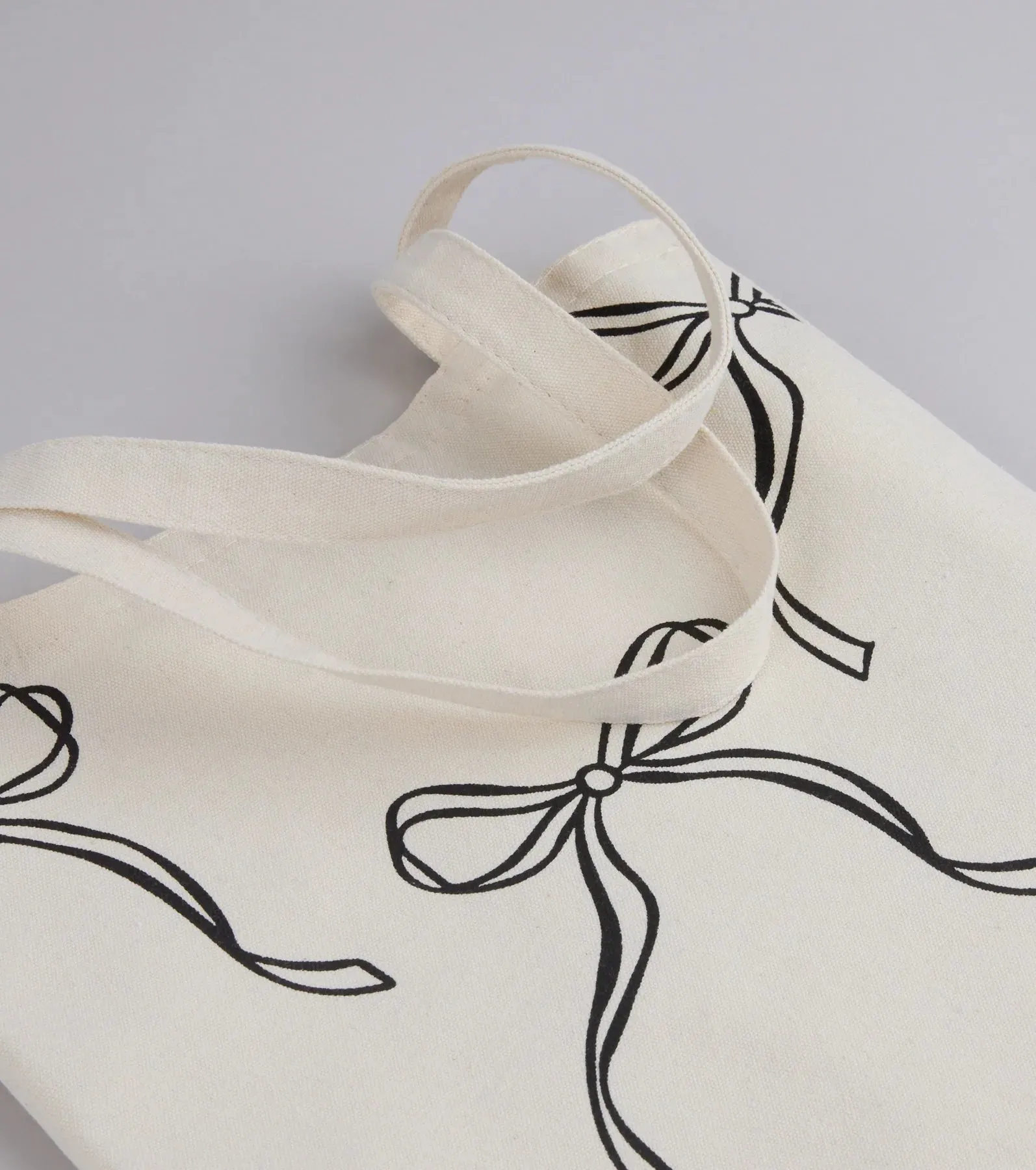 Take A Bow Print Canvas Tote Bag sold by Windsor product image thumbnail 2