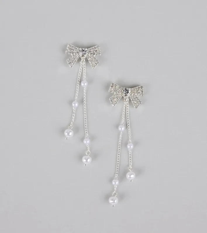 Darling Drama Rhinestone Bow Pearl Drop Earrings sold by Windsor