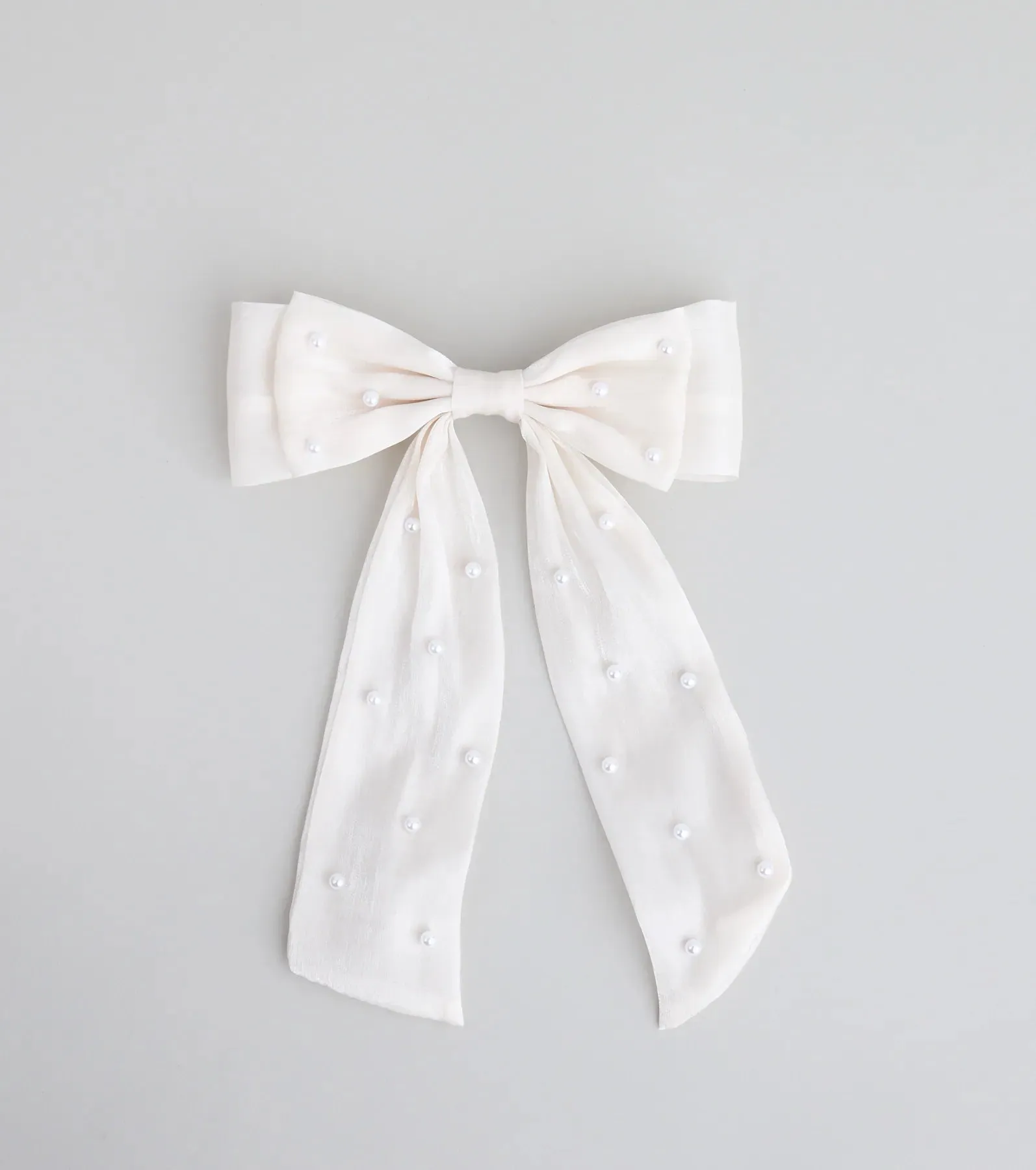 Tied With a Pearl Hair Bow sold by Windsor