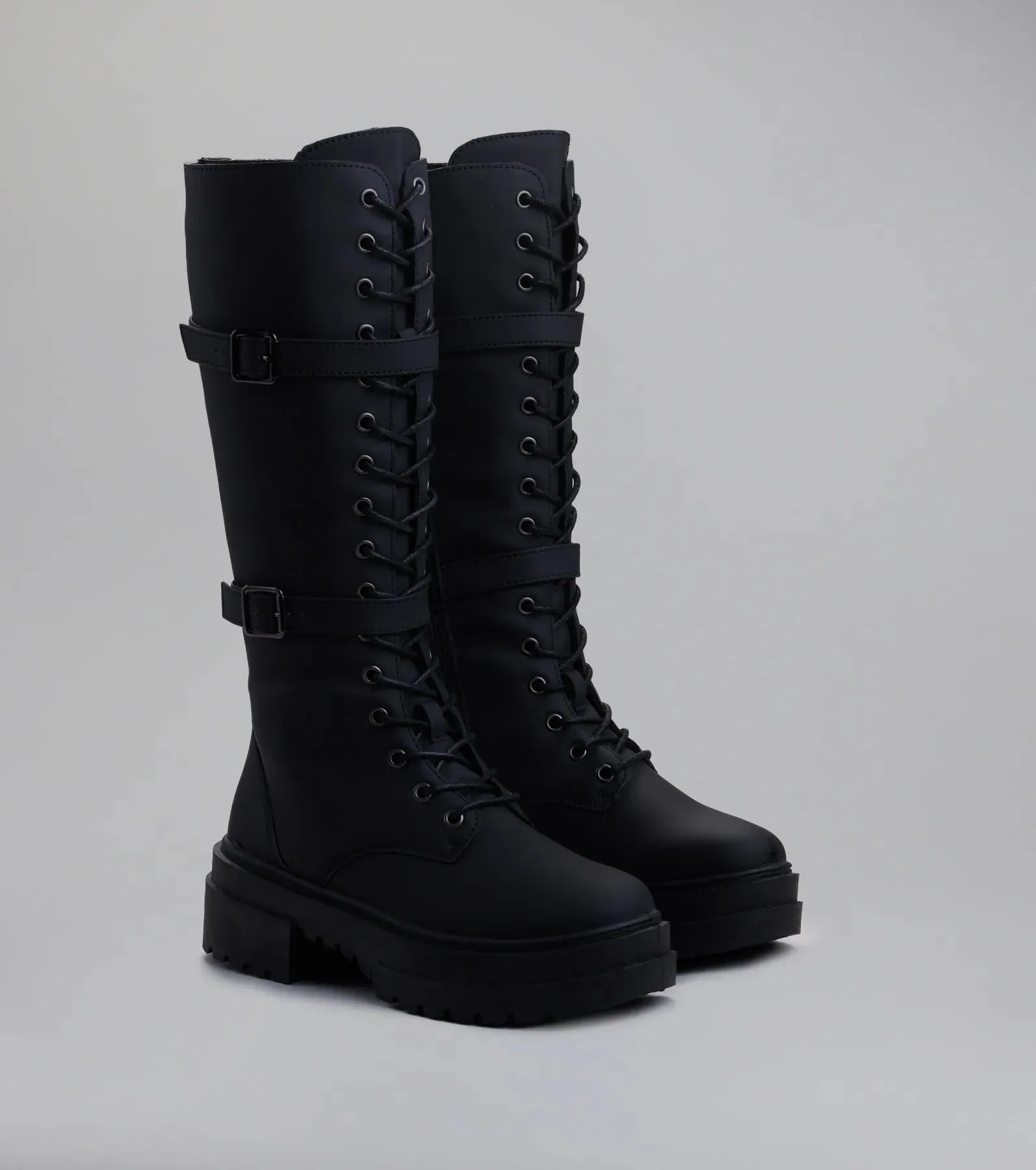 Serve and Slay Under The Knee Combat Boots sold by Windsor