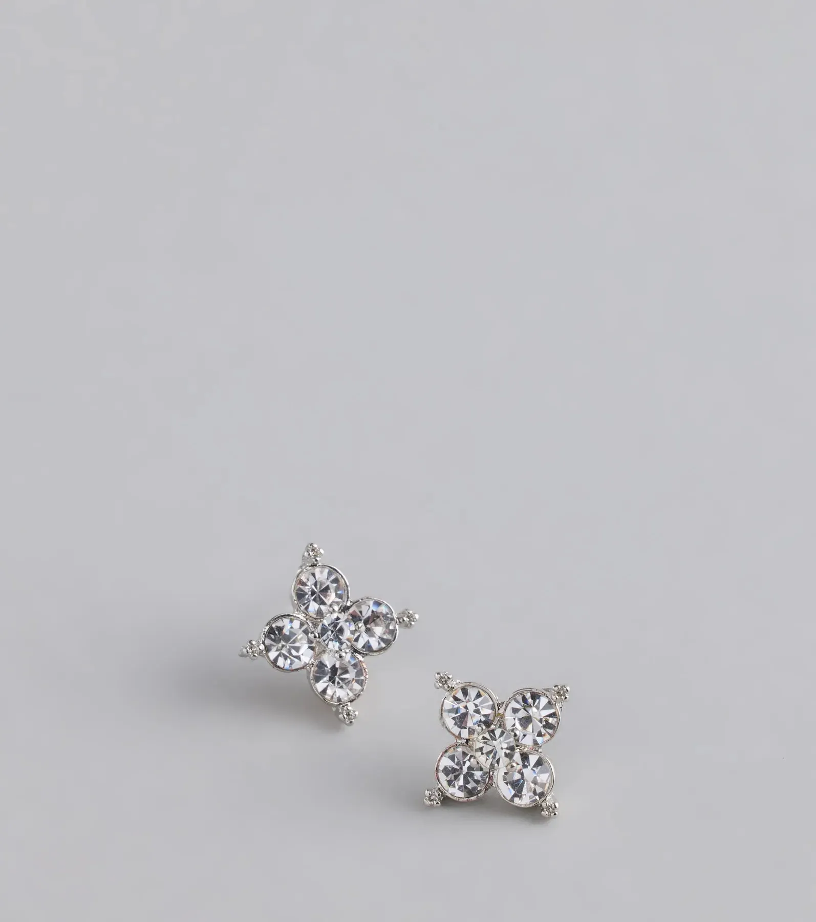 Lucky And Glam Rhinestone Clover Stud Earrings sold by Windsor