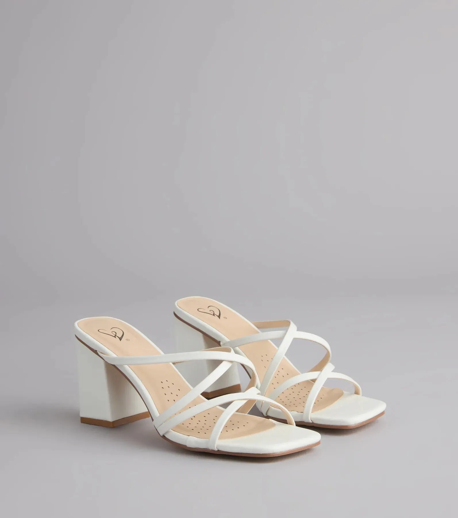 On Point Criss-Cross Strappy Mules sold by Windsor