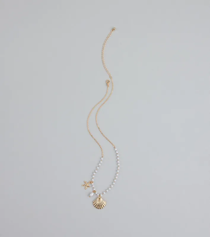 Seas The Day Pearl and Charm Statement Necklace sold by Windsor