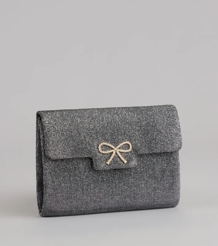 Put A Bow On It Sparkle Clutch sold by Windsor