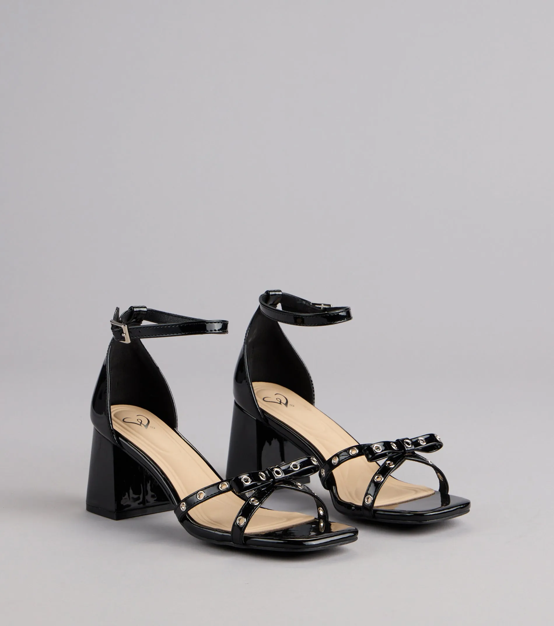 City Lights Bow Grommet Block Heels sold by Windsor