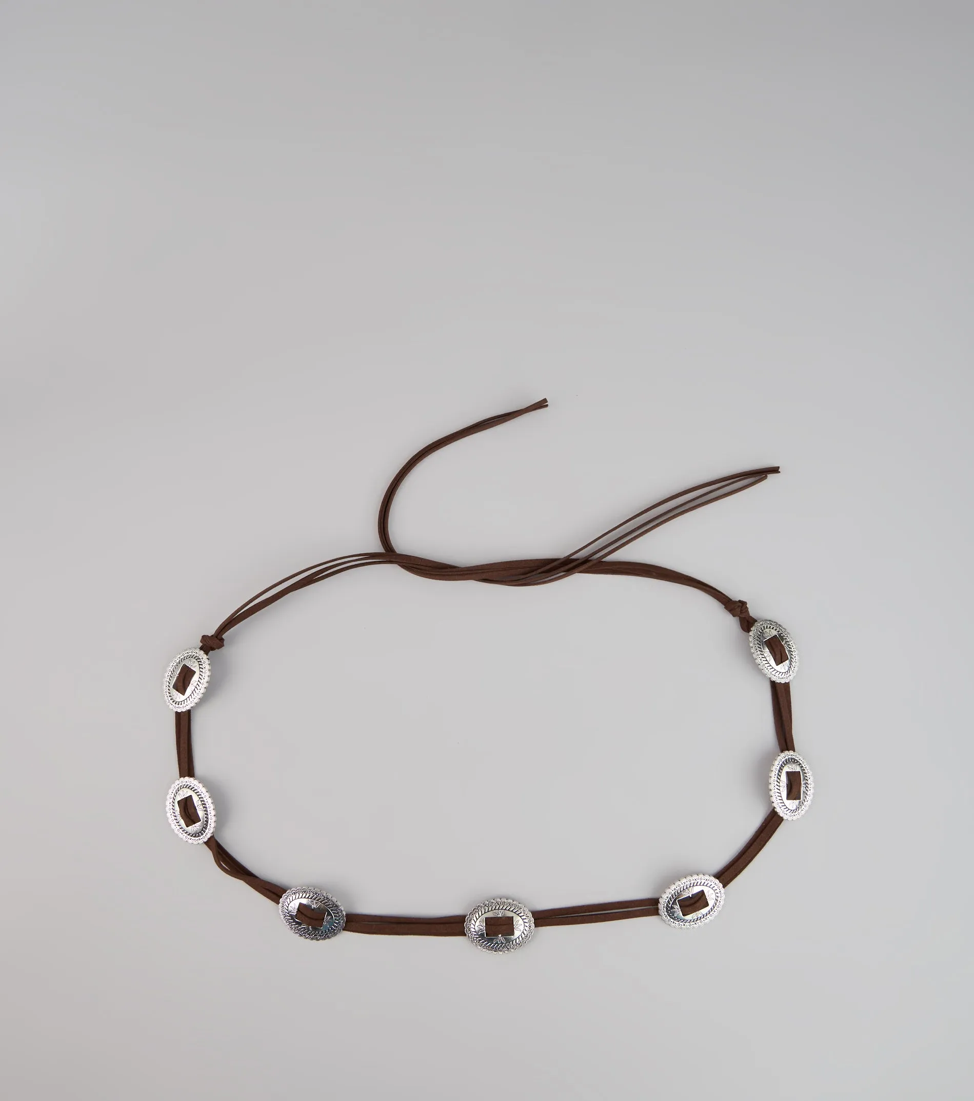 Western Glow Concho String Belt sold by Windsor