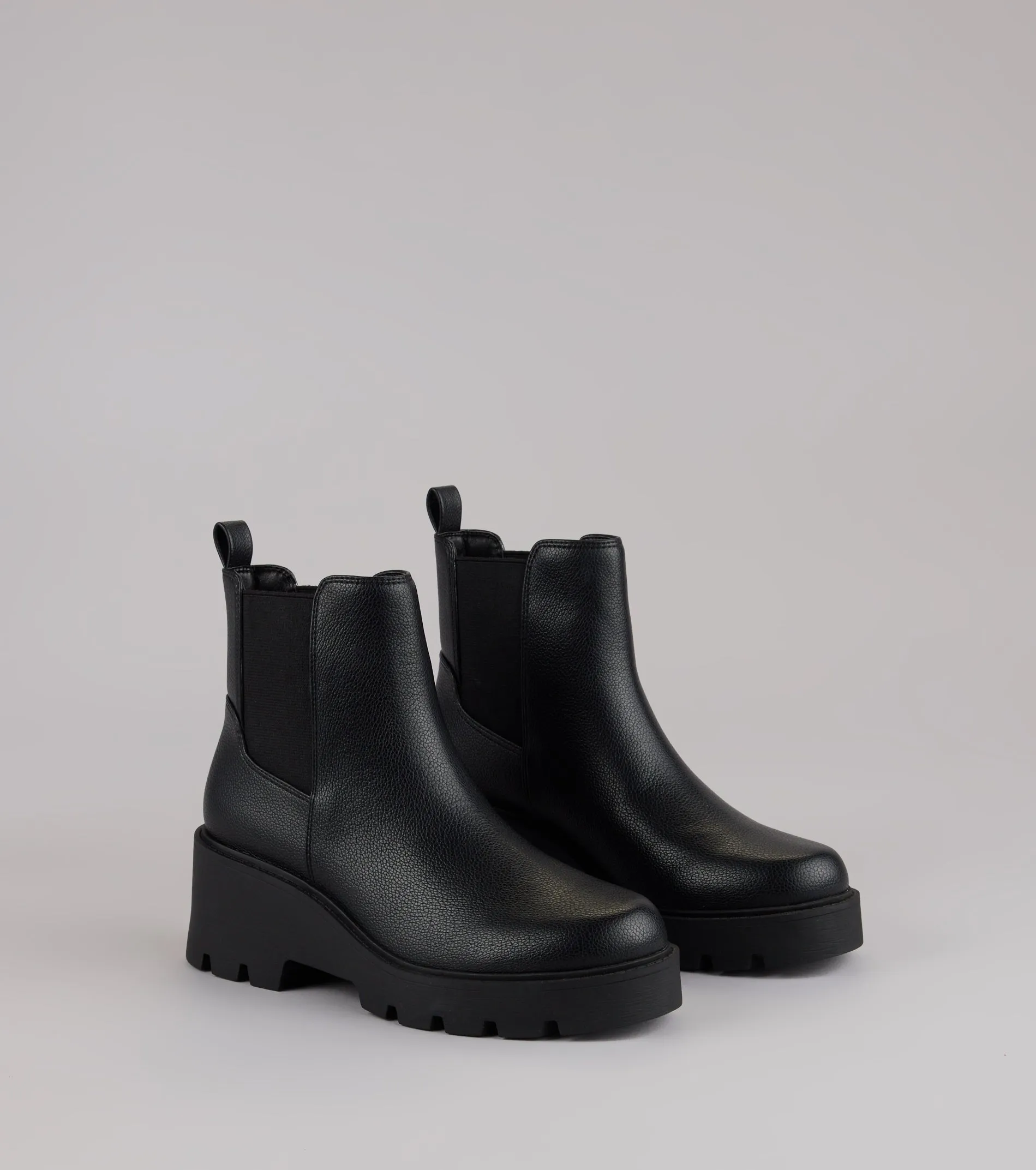 Instant Edge Platform Ankle Booties sold by Windsor