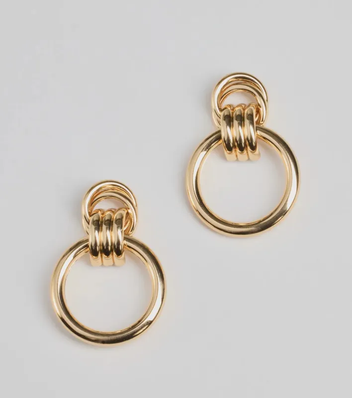 Platinum Status Door Knocker Hoop Earrings sold by Windsor