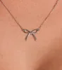 Pretty Look Dainty Bow Charm Necklace sold by Windsor