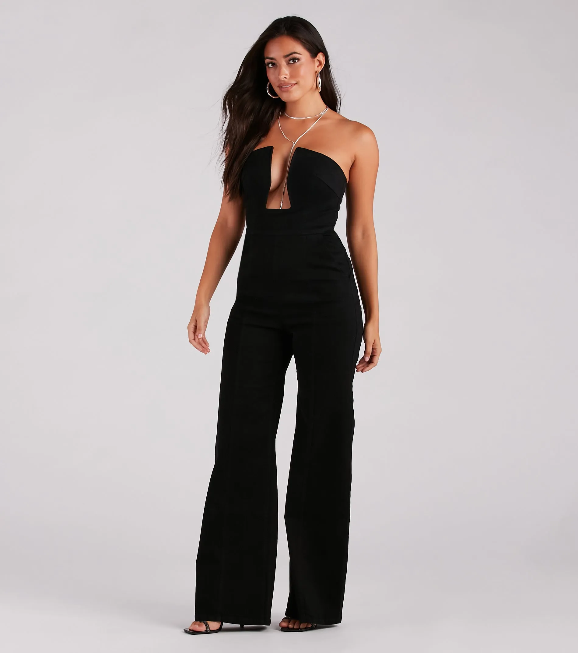 Entice The Night Plunge Neck Denim Jumpsuit sold by Windsor