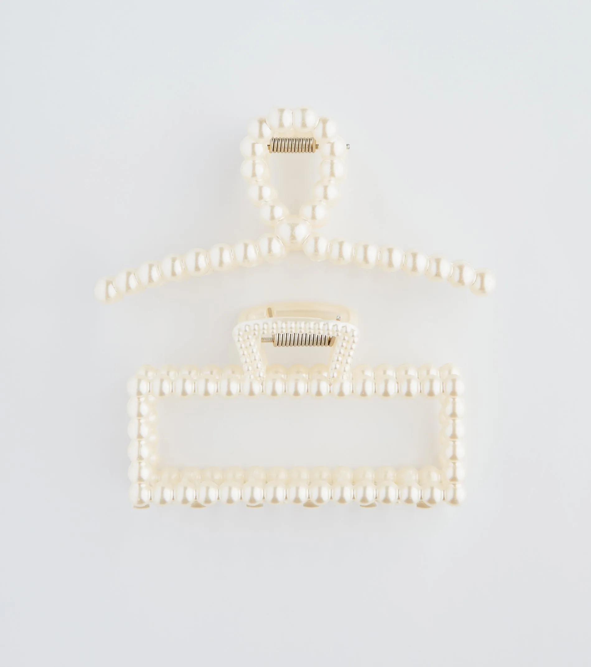 Polished And Chic Pearl Hair Claw Clip Set sold by Windsor