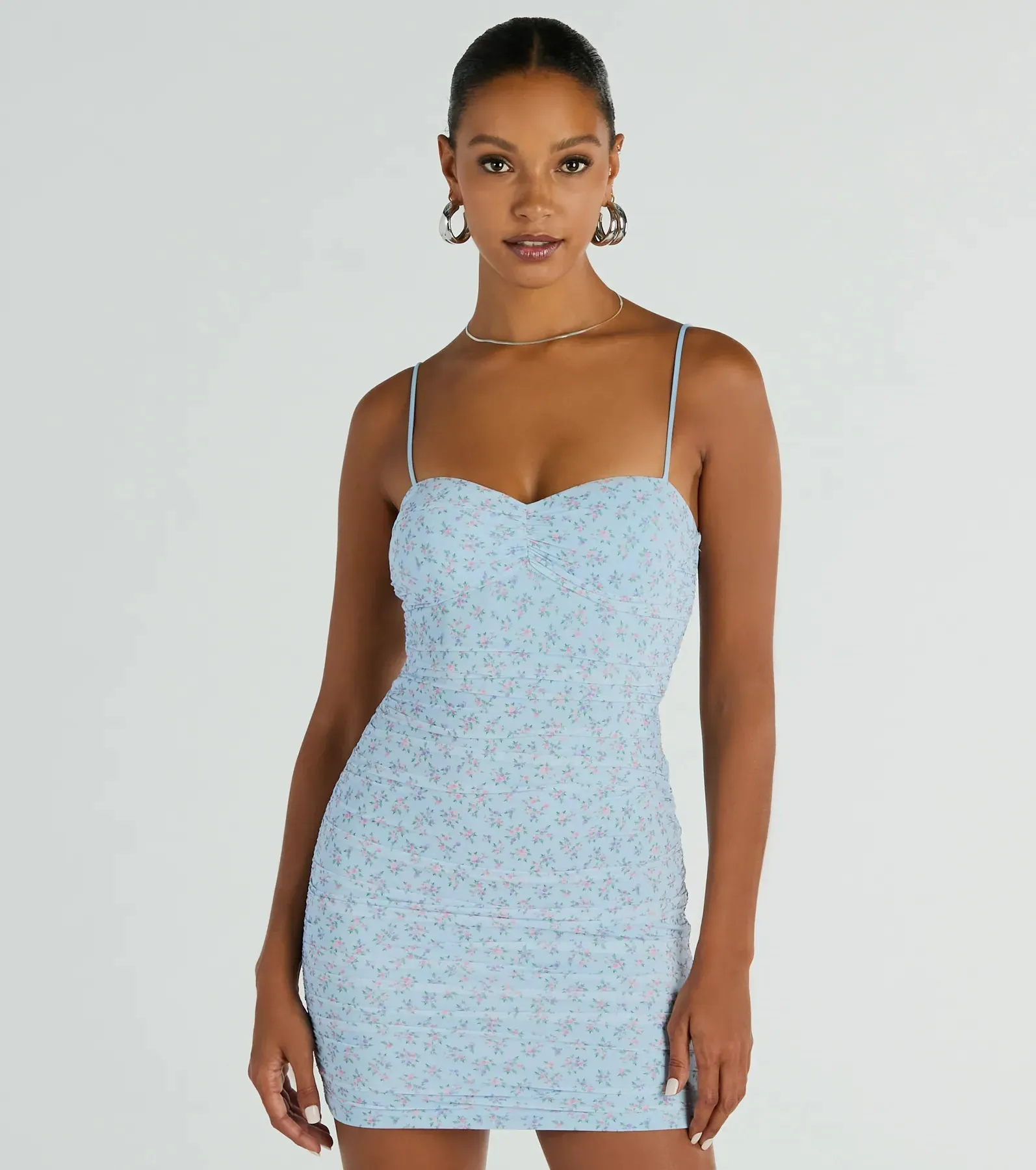 Sweet Feelings Sleeveless Ditsy Floral Mini Dress sold by Windsor