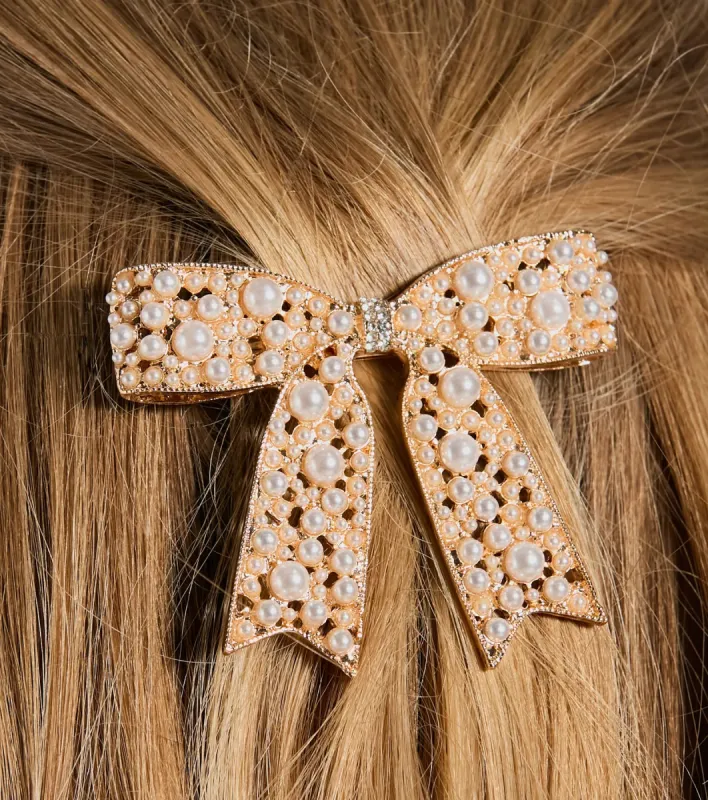 Ideal Beauty Faux Pearl Rhinestone Bow Barrette sold by Windsor
