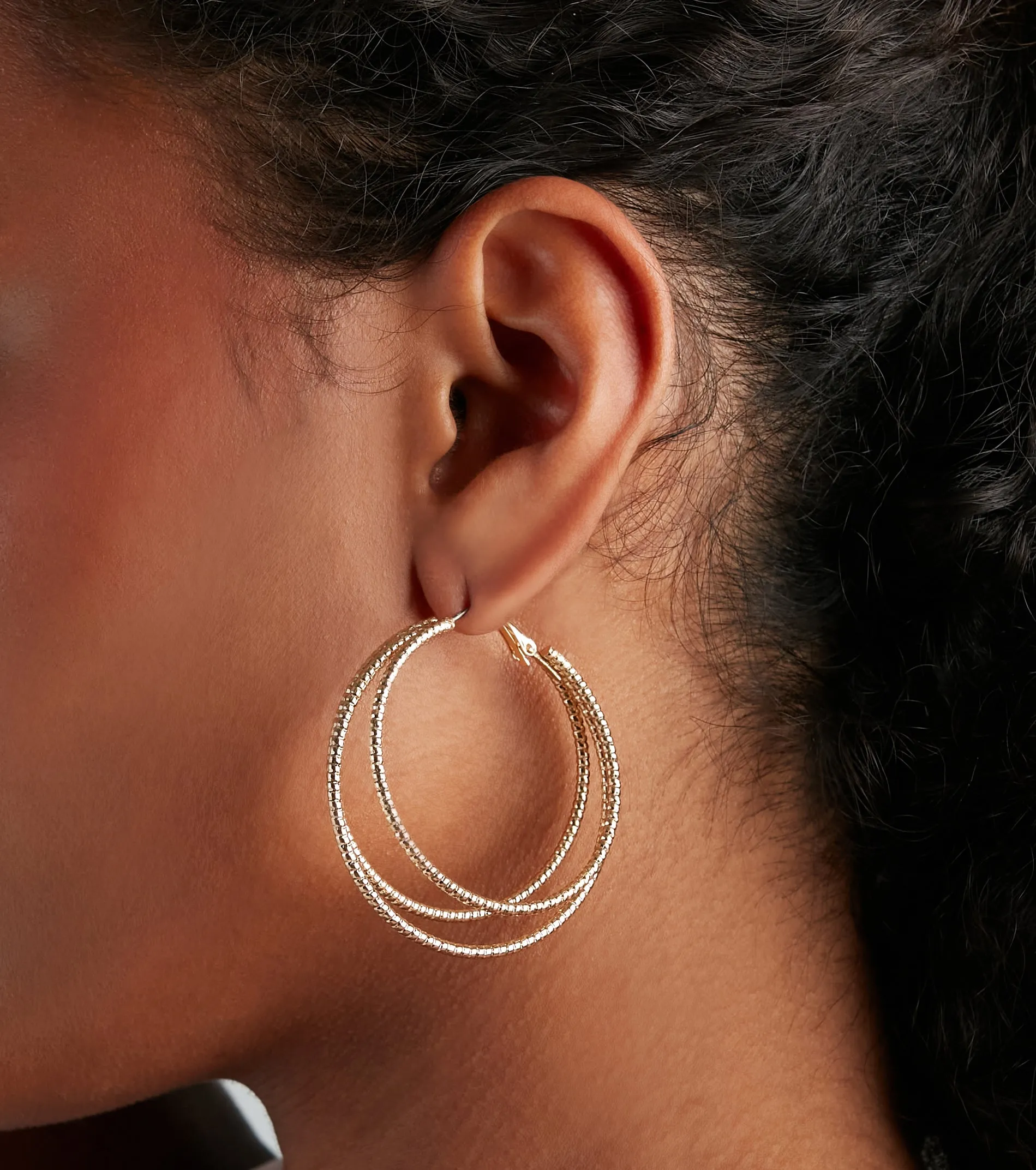 Triple Threat Statement Hoop Earrings sold by Windsor