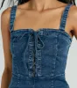 Enticing Flirty Sleeveless Lace-Up Denim Romper sold by Windsor