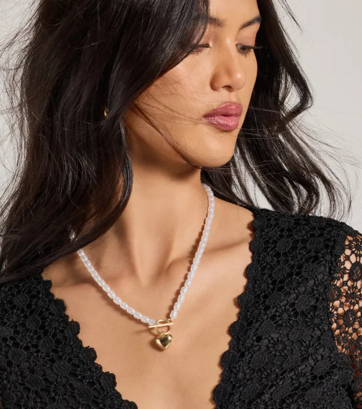 Pretty Glamour Heart Charm Pearl Necklace sold by Windsor