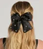 Feminine Charm Pearl Detail Hair Bow Barrette sold by Windsor