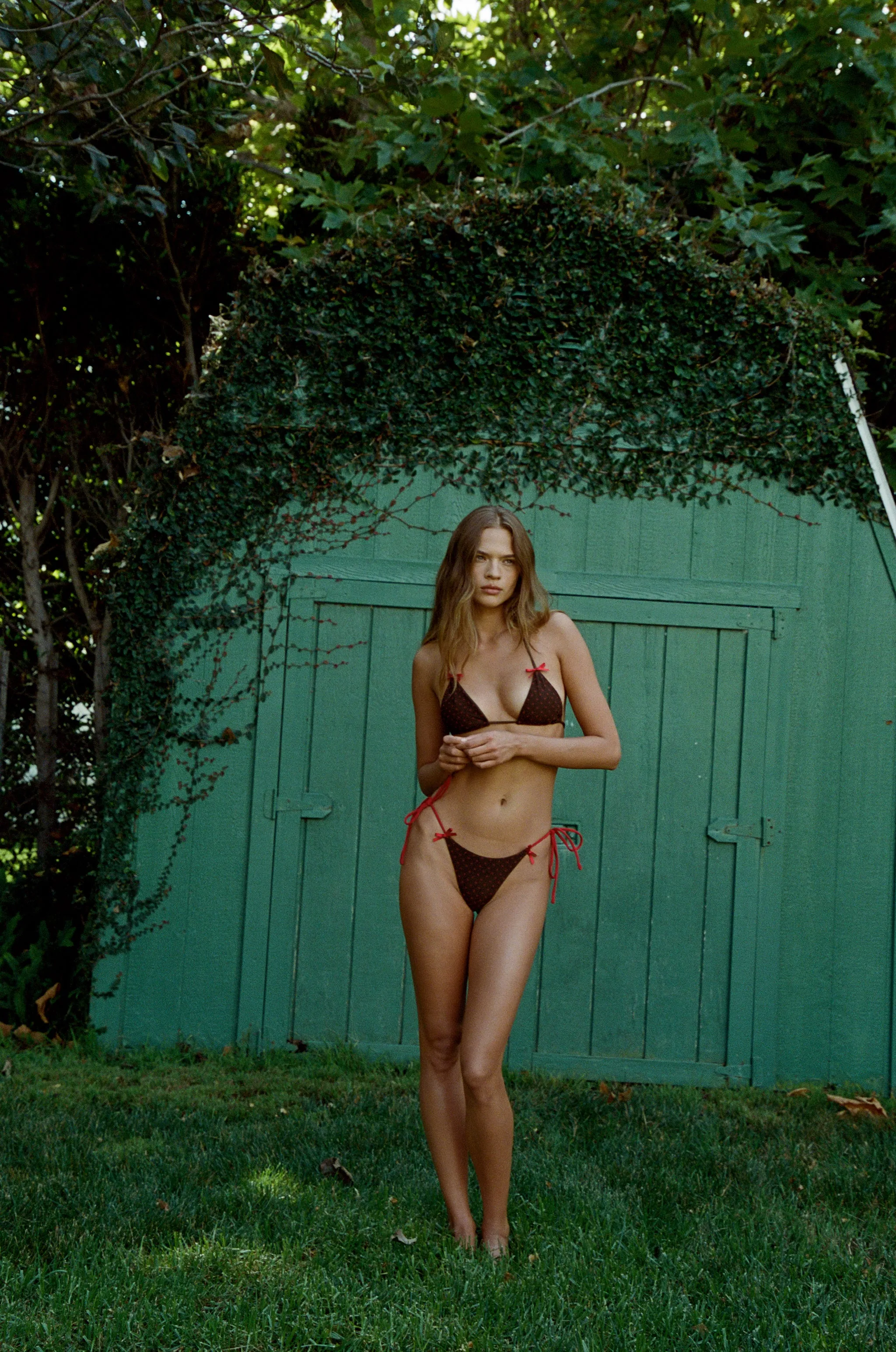 Juni Bikini Top | Brown / Red Polka Dot sold by With Jean