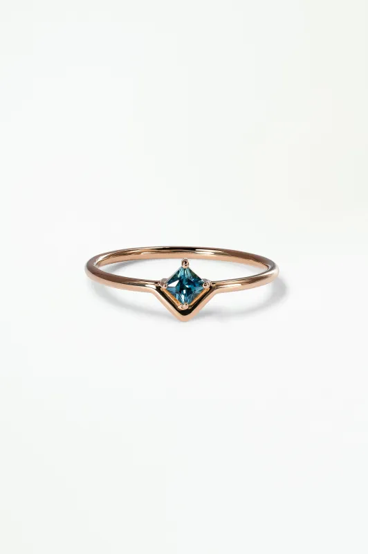Small Princess Cut Teal Sapphire Nestled Ring sold by WWAKE