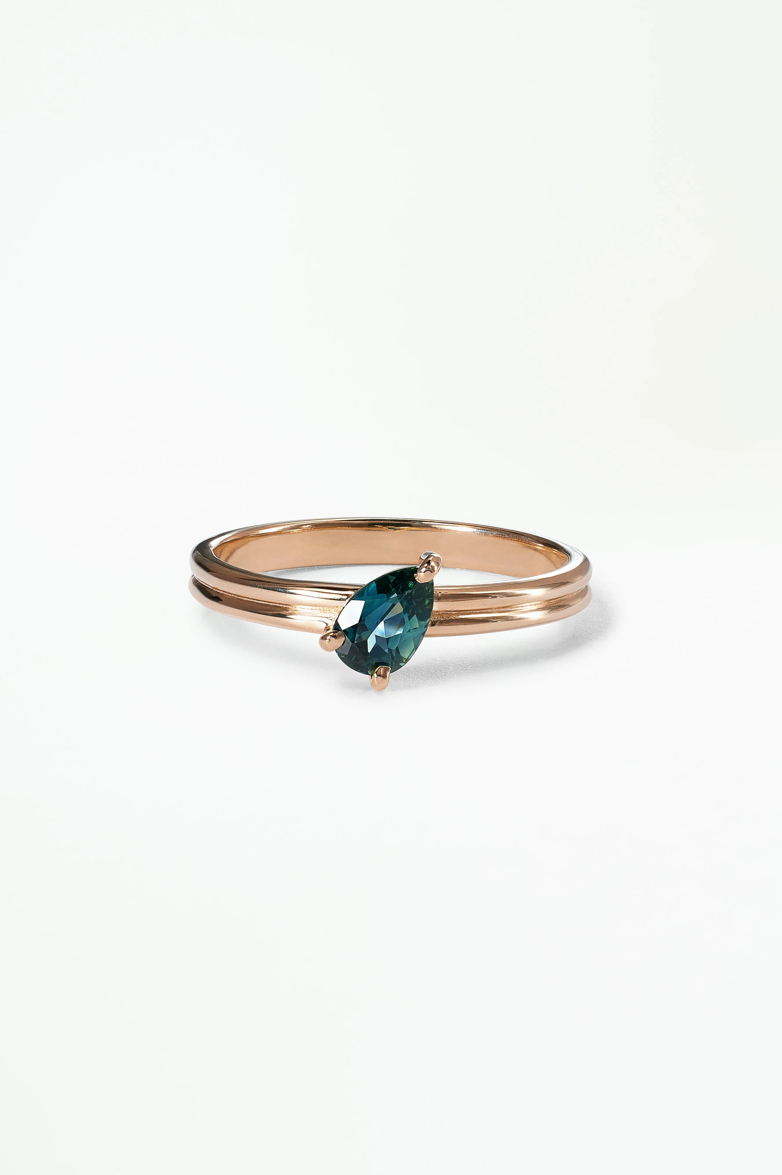 Medium Tilted Pear Cut Teal Sapphire Double Band Solitaire Ring sold by WWAKE