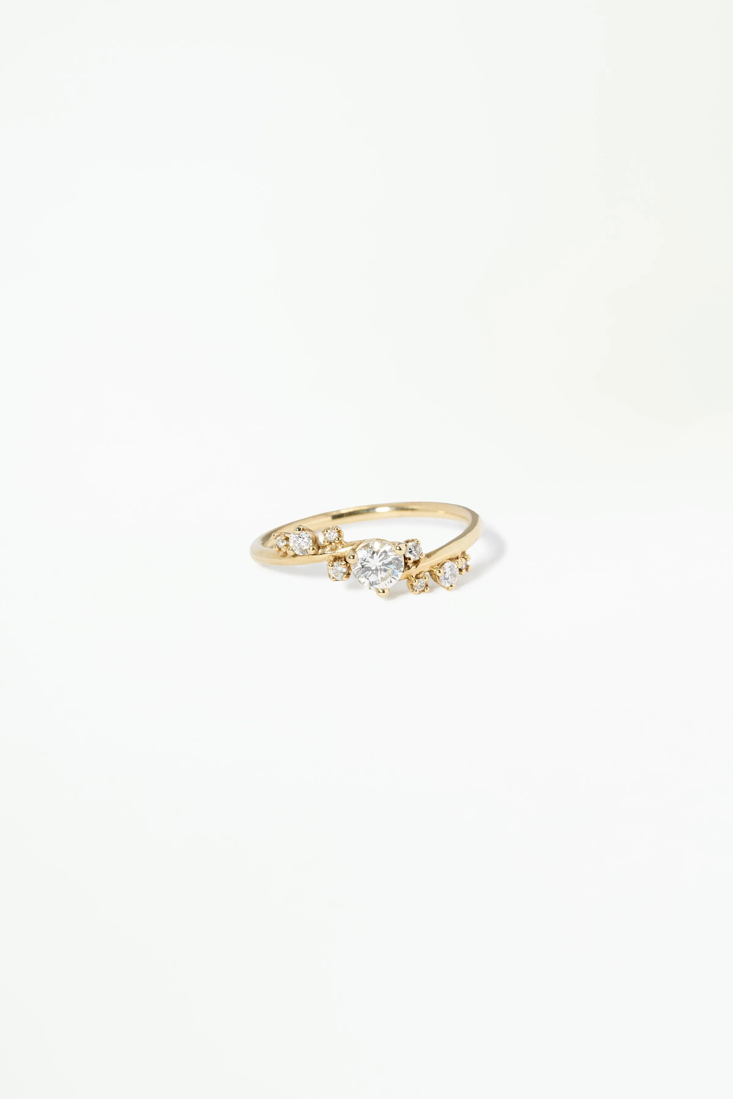 Round Cut Diamond Organic Crossover Ring sold by WWAKE
