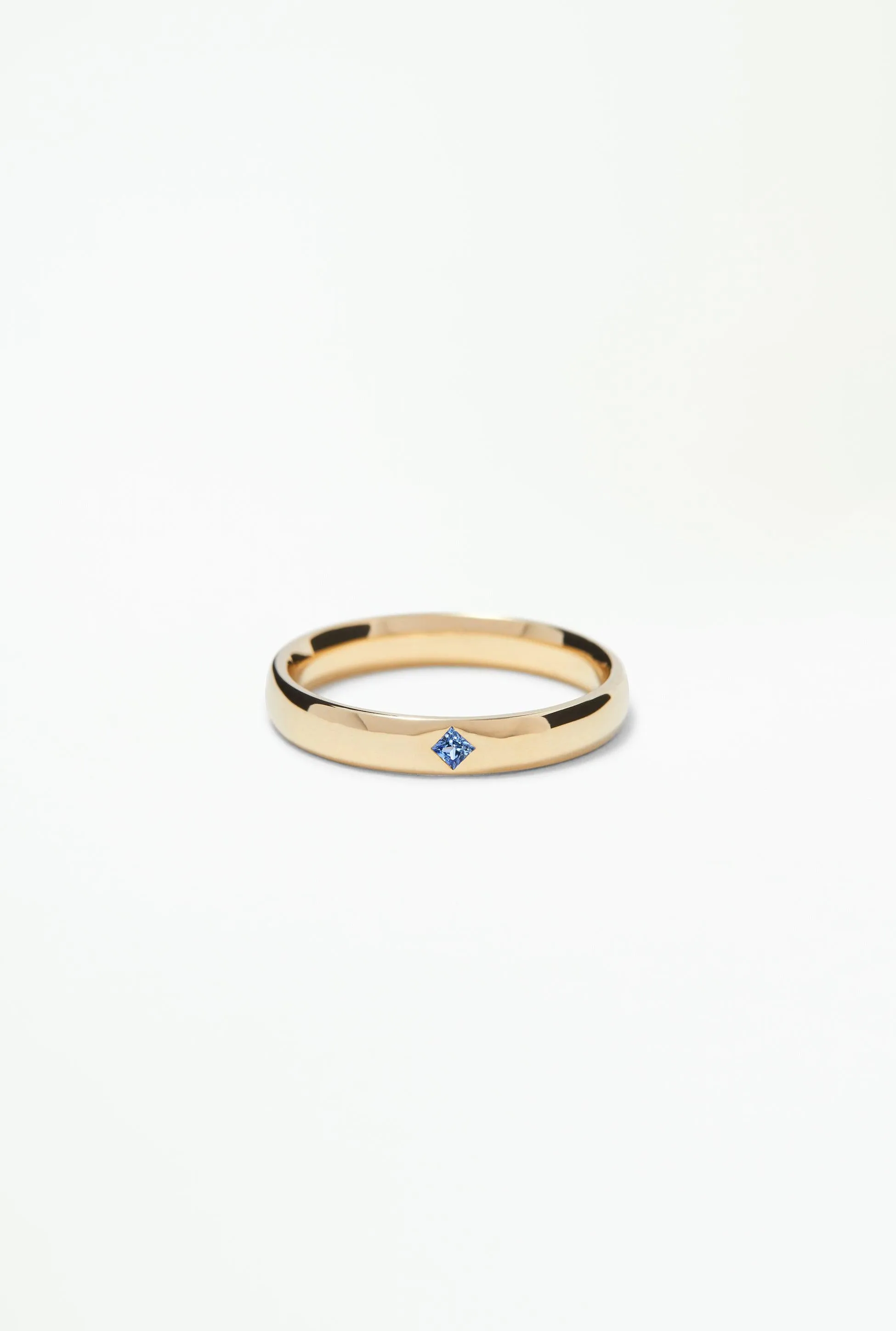 One of a Kind Princess Cut Blue Sapphire Row Ring sold by WWAKE