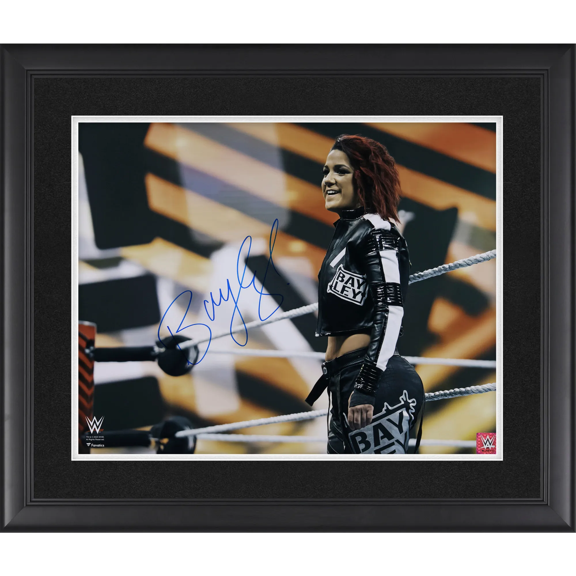Bayley WWE Autographed Framed 16" x 20" Standing on Apron Photograph sold by WWE