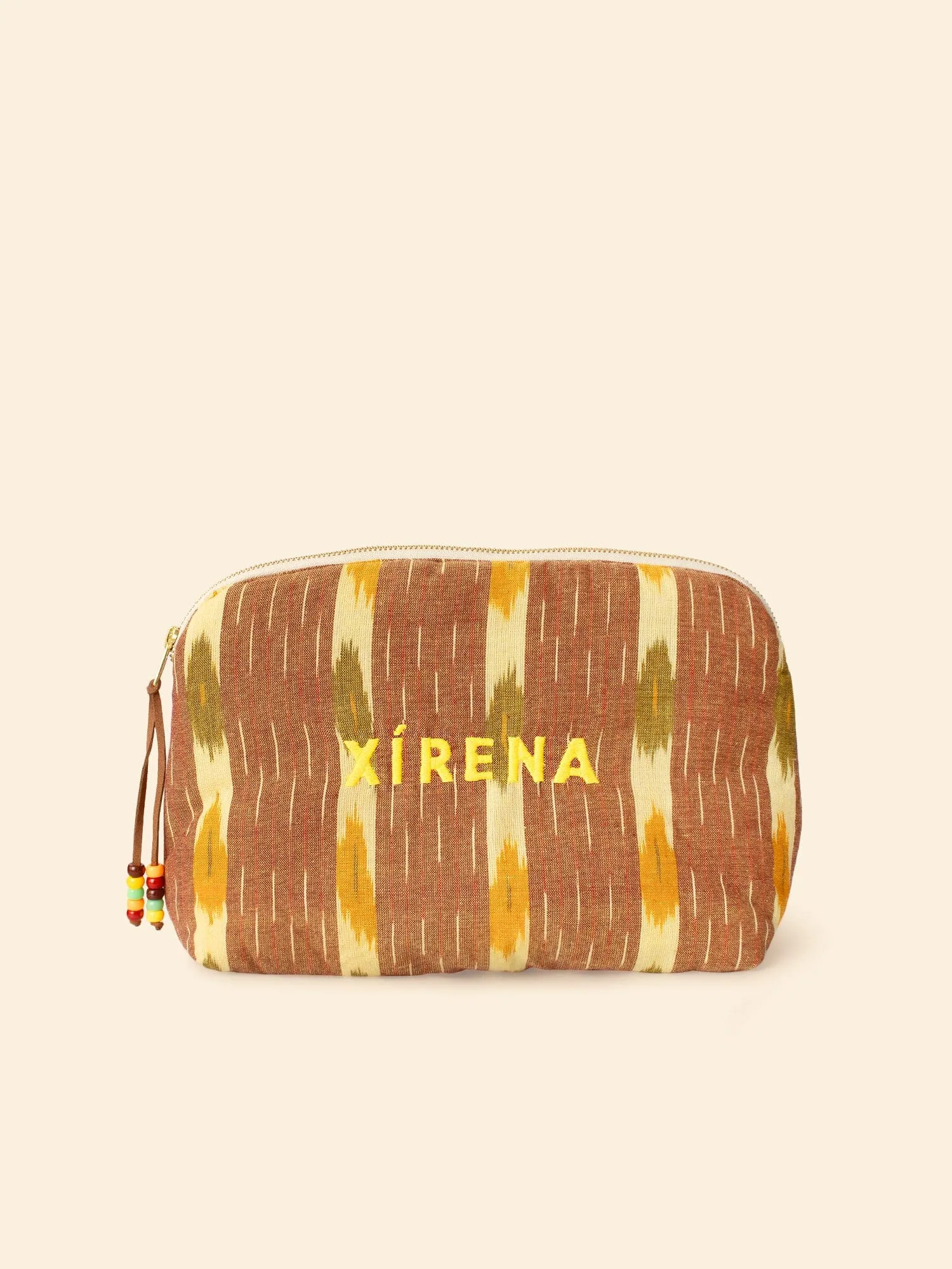 Amber Ikat Ellie Pouch sold by XiRENA