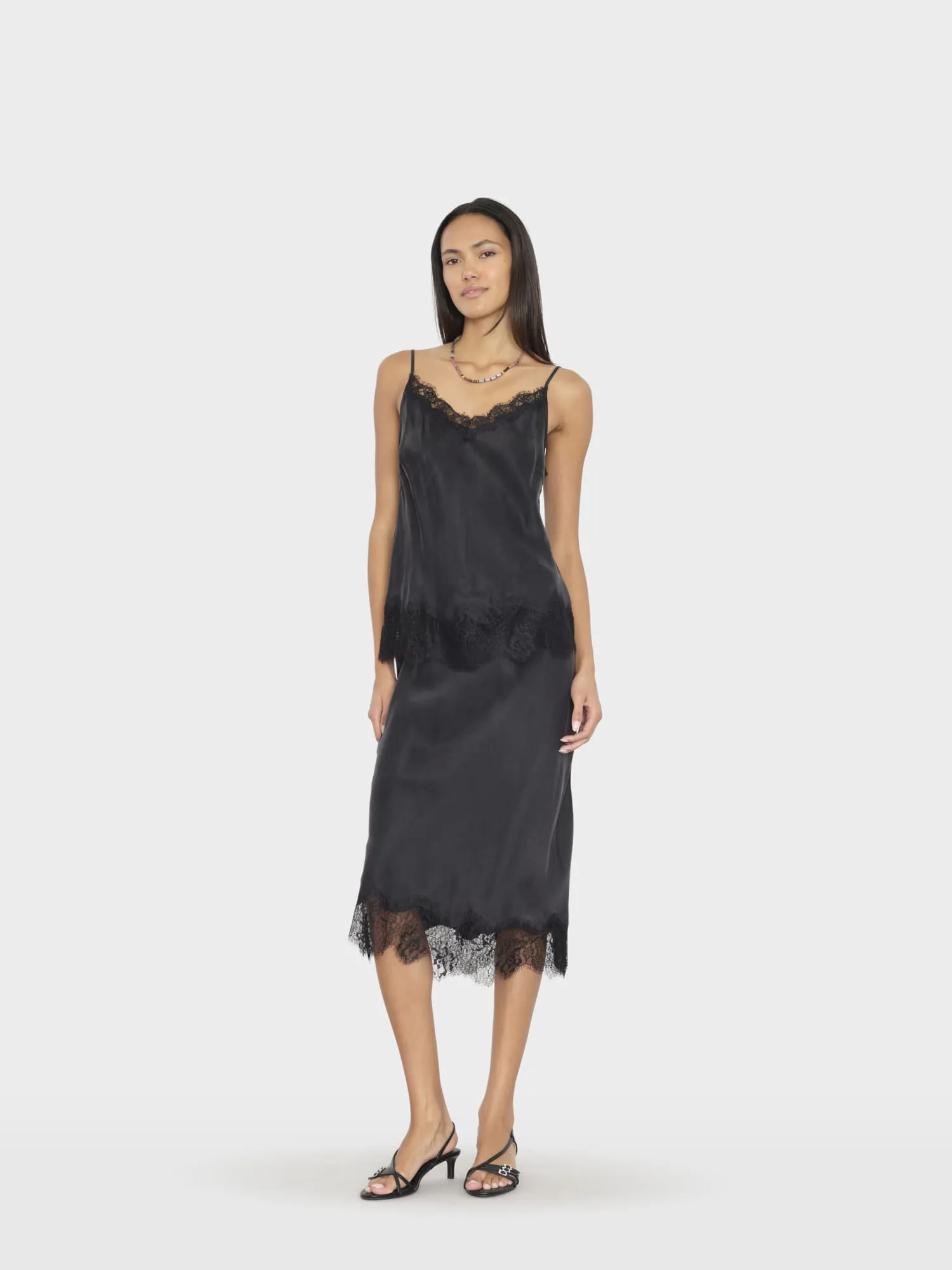 Black Yvette Skirt sold by XiRENA