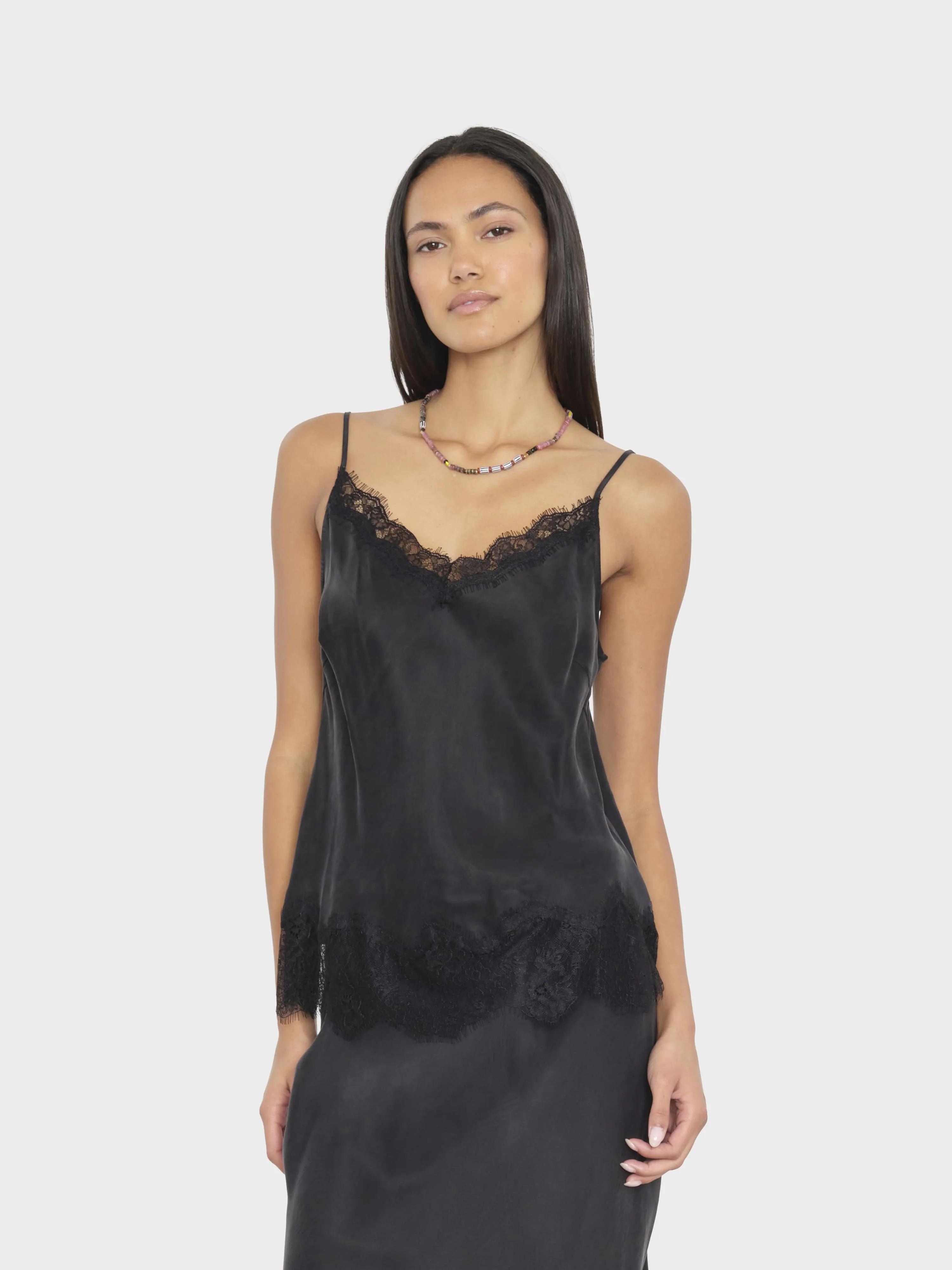 Black Colette Top sold by XiRENA