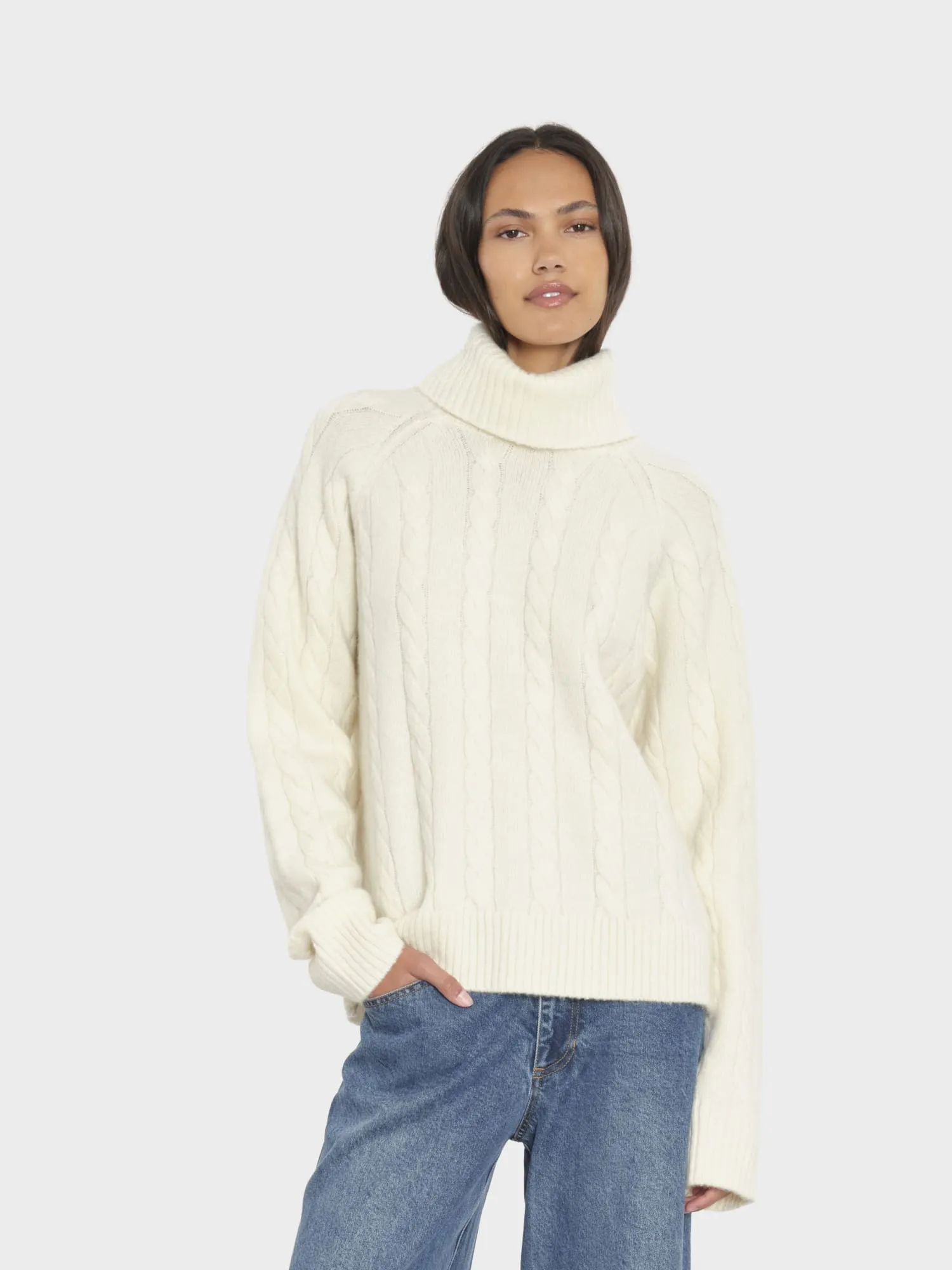 Cream Feather Toby Sweater sold by XiRENA