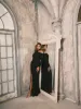 "Aletta" Jersey Knit Long Sleeve One Shoulder Cut Out Long Dress sold by Xscape