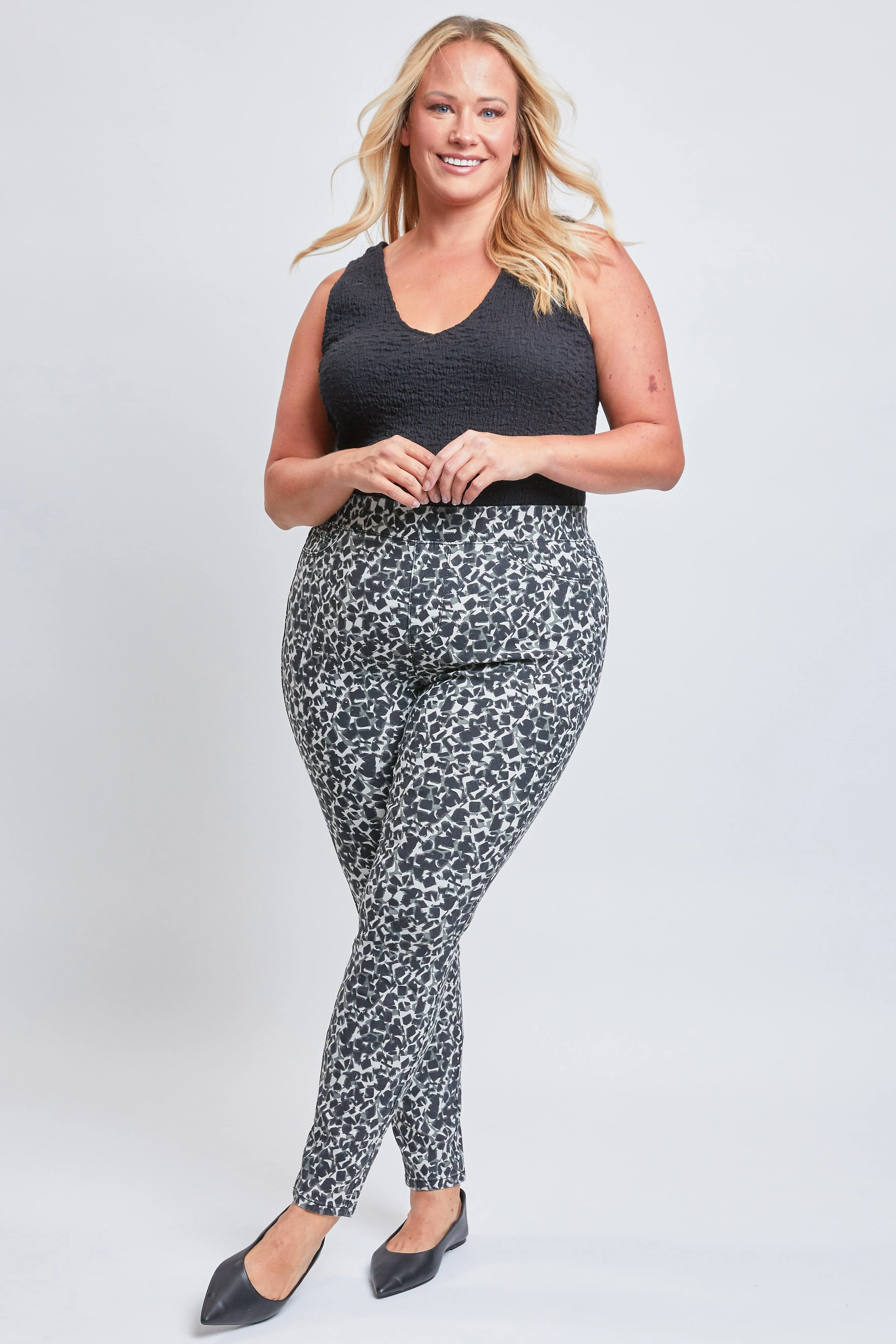 Women's Plus Size Mid Rise Jeggings sold by YMI
