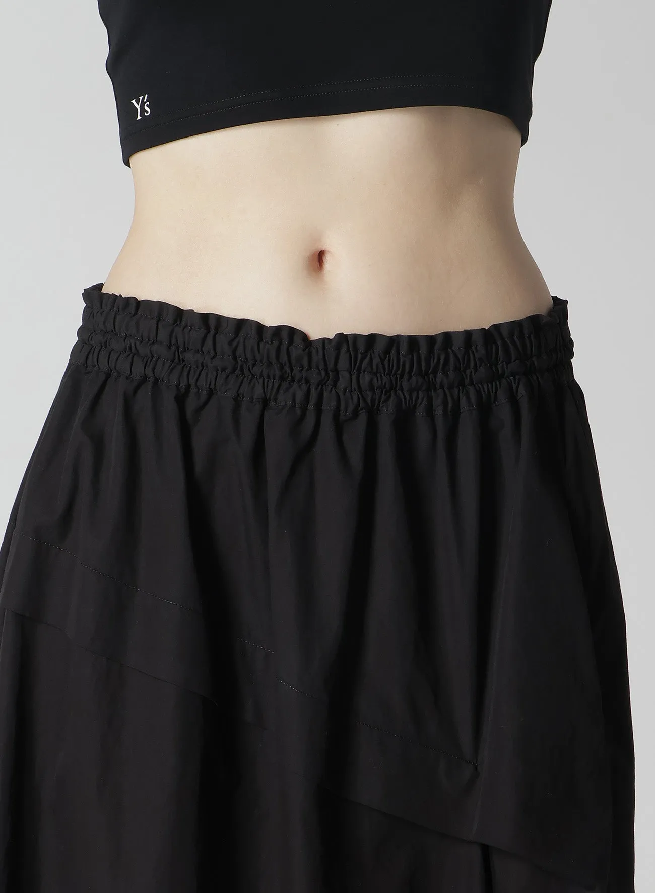 COTTON BROAD GARMENT DYEING RIGHT TUCKED ASYMMETRIC SKIRT sold by Yohji Yamamoto product image thumbnail 5
