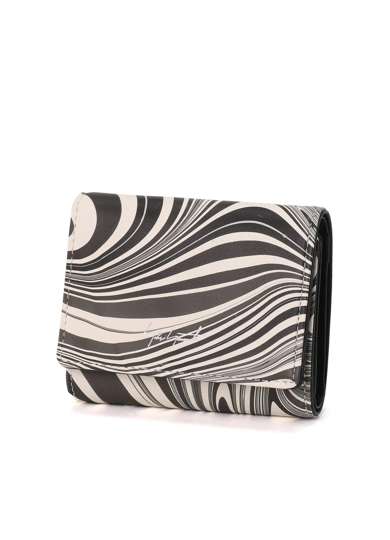 COMPACT sold by Yohji Yamamoto