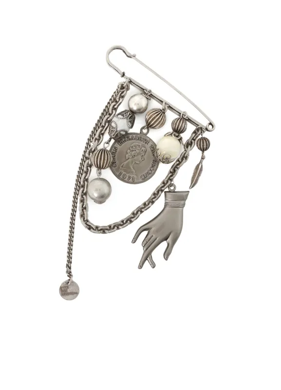 BRASS MULTI-MOTIF BROOCH sold by Yohji Yamamoto