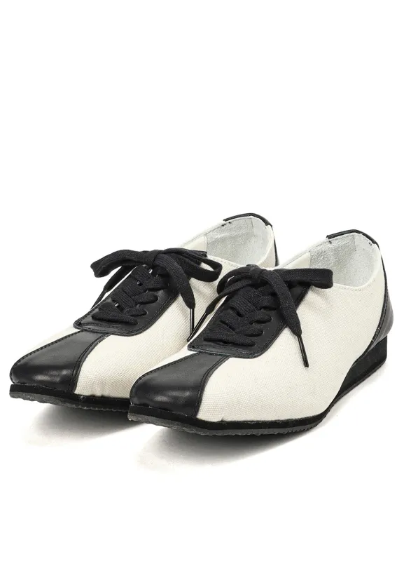 CANVAS 6HOLES LOW CUT SHOES sold by Yohji Yamamoto