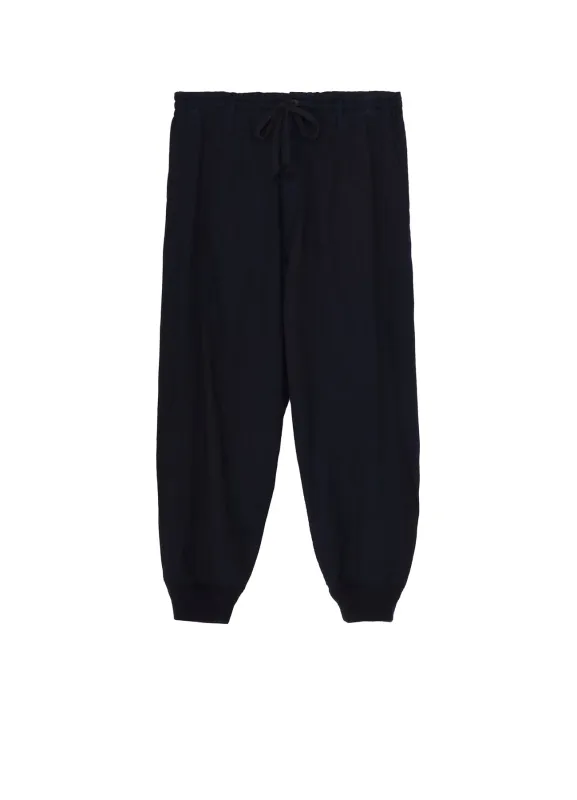 INDIGO DYED COTTON TWILL RIBBED HEM PANTS sold by Yohji Yamamoto