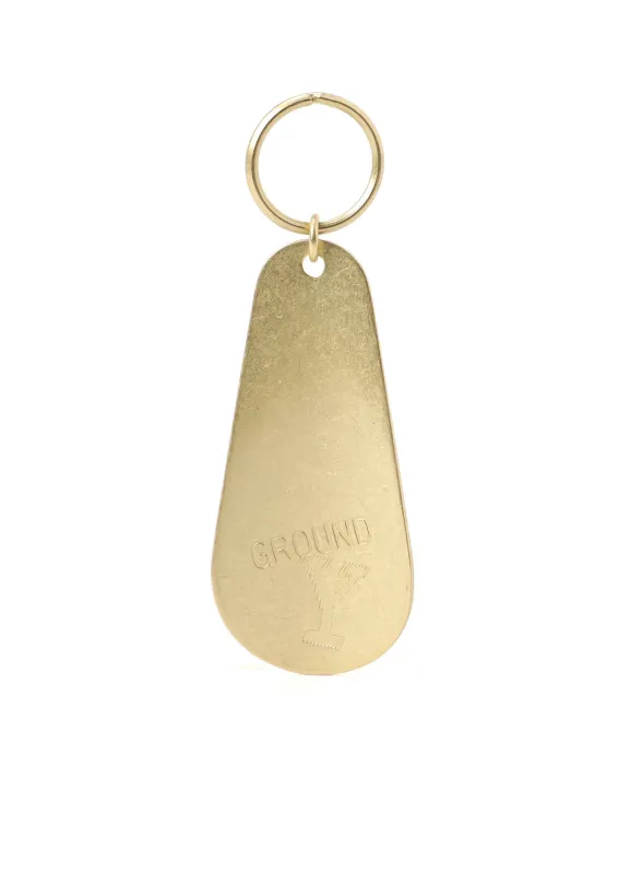 BRASS SHOEHORN KEY CHARM sold by Yohji Yamamoto