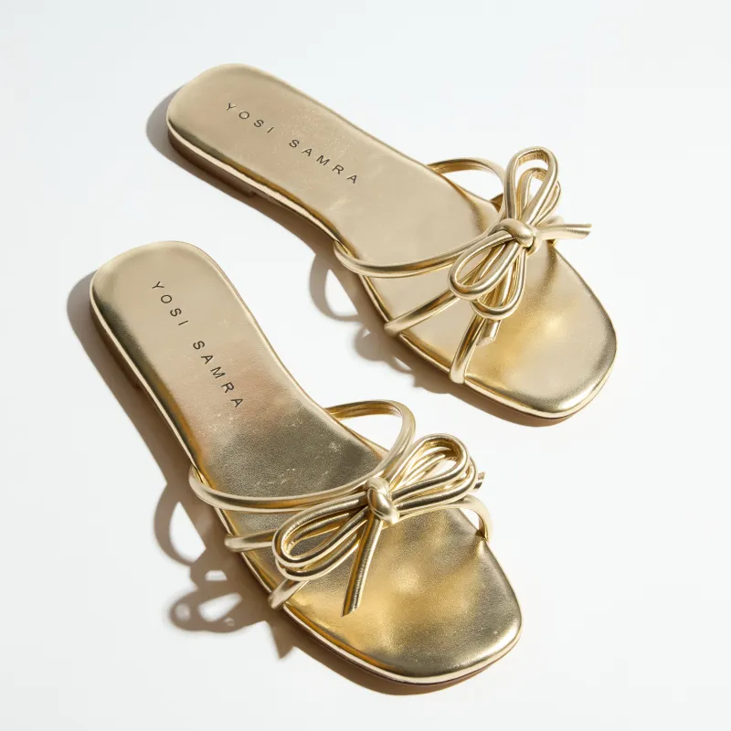 Nicole Bow Slide Sandal in Gold sold by Yosi Samra