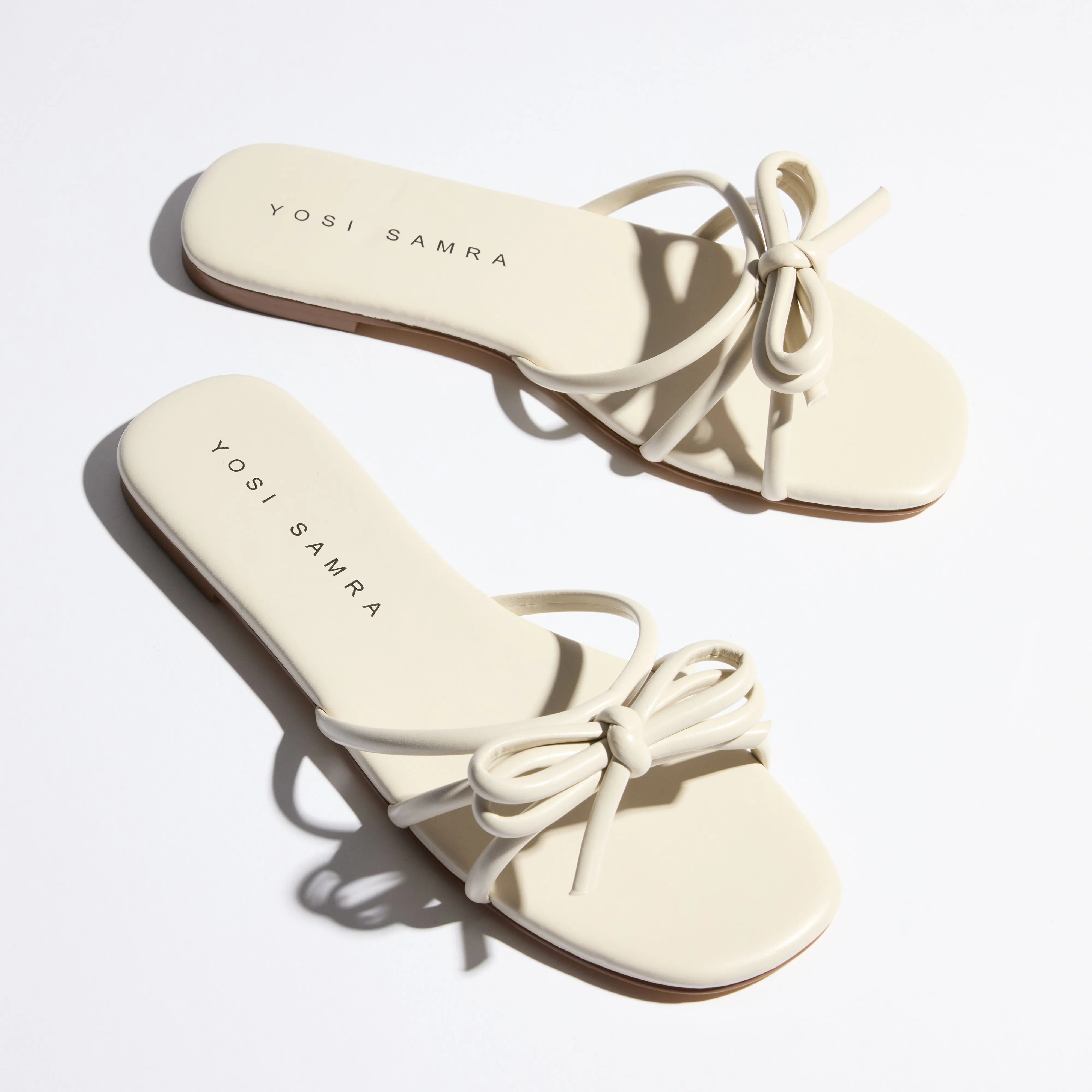 Nicole Bow Slide Sandal in Bone sold by Yosi Samra