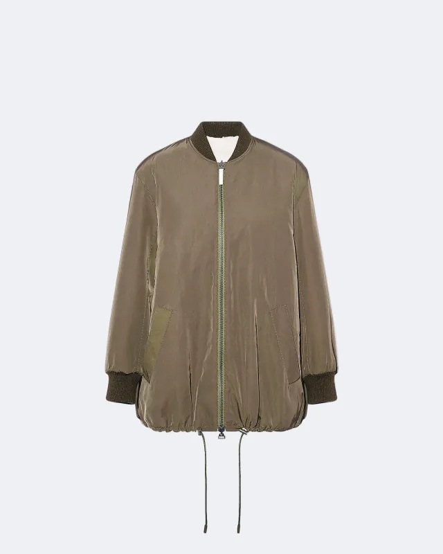 Teddy long en tissu technique réversible peau lainée sold by Yves Salomon