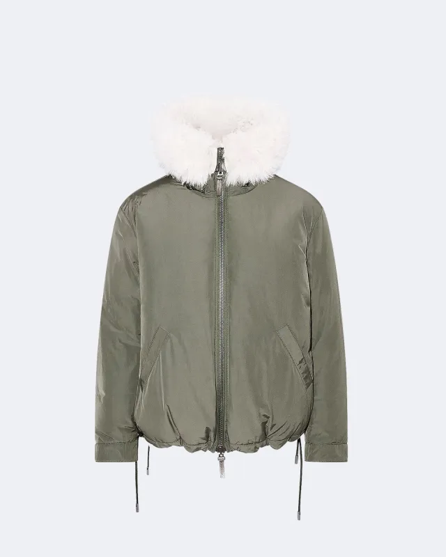 Veste à capuche en tissu technique réversible peau lainée sold by Yves Salomon