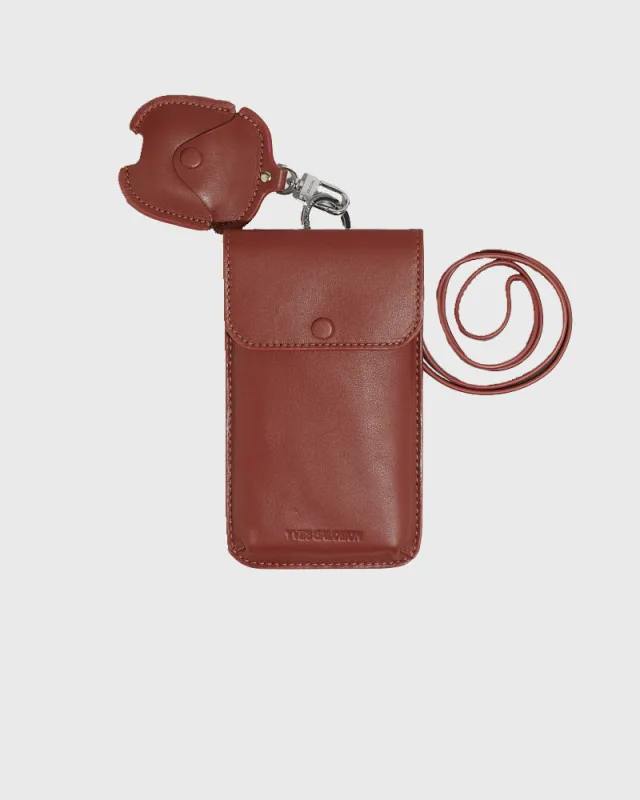 Étui de téléphone avec airpods amovible en cuir sold by Yves Salomon